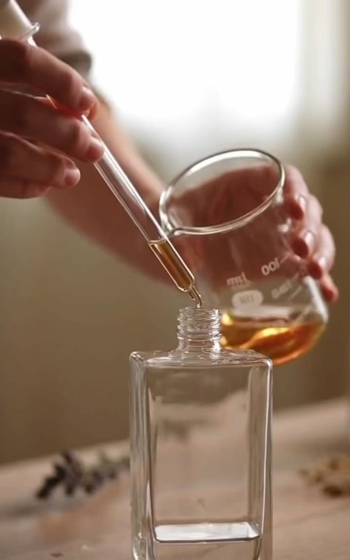 Load video: Hand-filling personalised mini perfume favours for events in the UK.